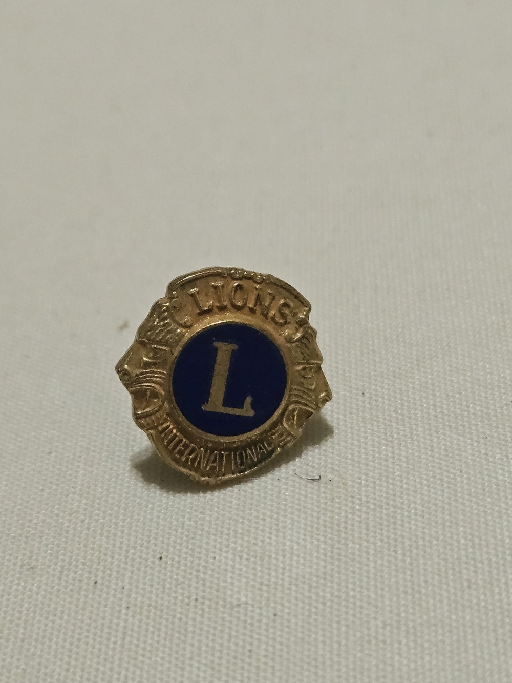 Lisa international Gold-Tone Lapel Pin with Blue Enamel Center